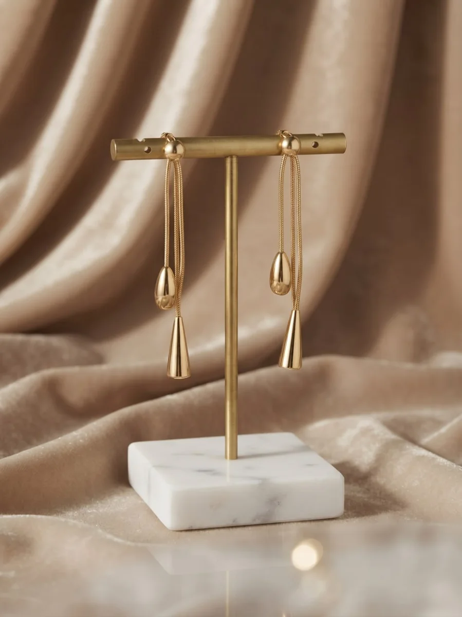 Boucles d'oreilles pendantes gouttes dorées