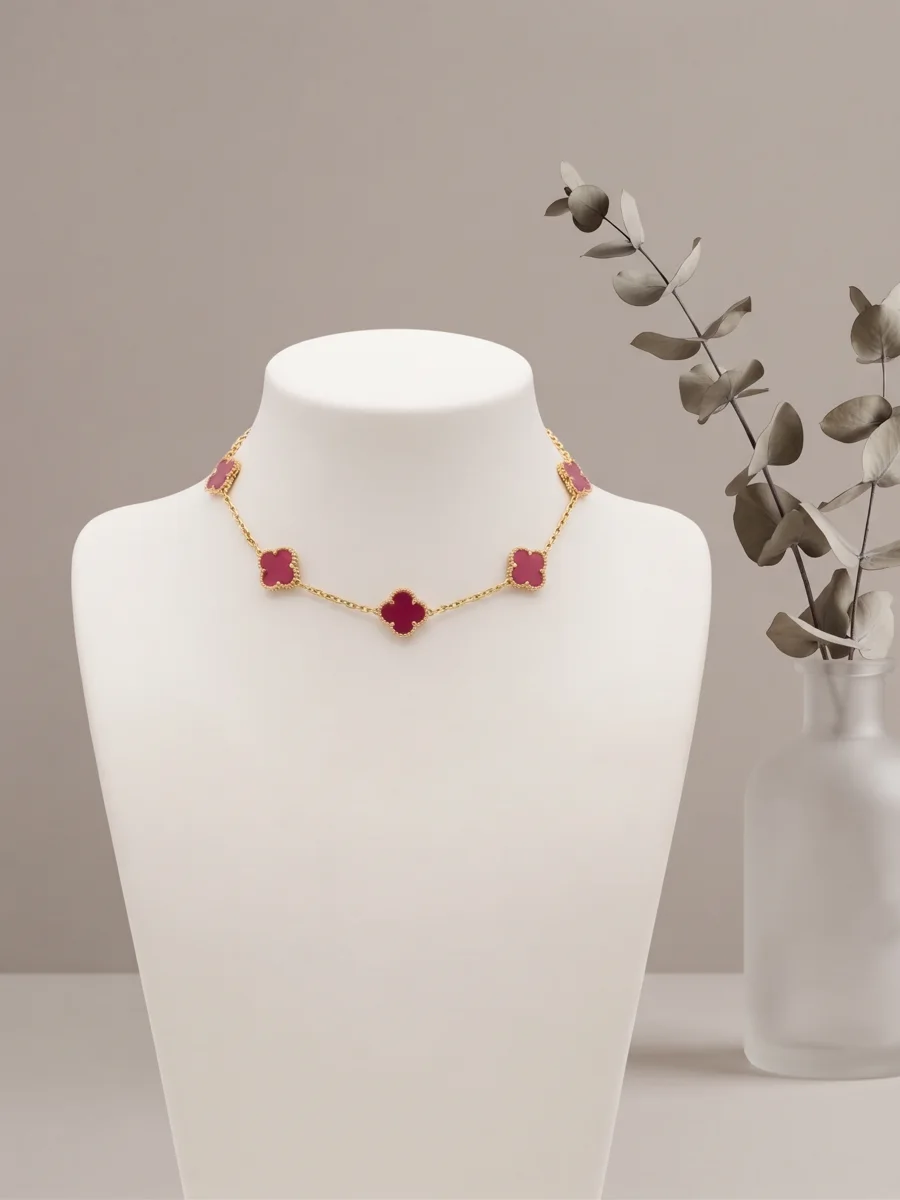 Bracelet trèfles framboise doré