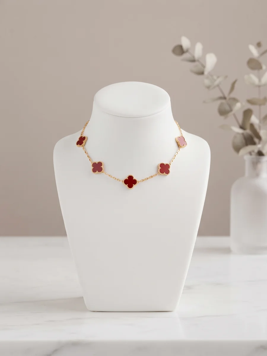 Bracelet trèfles rouges doré